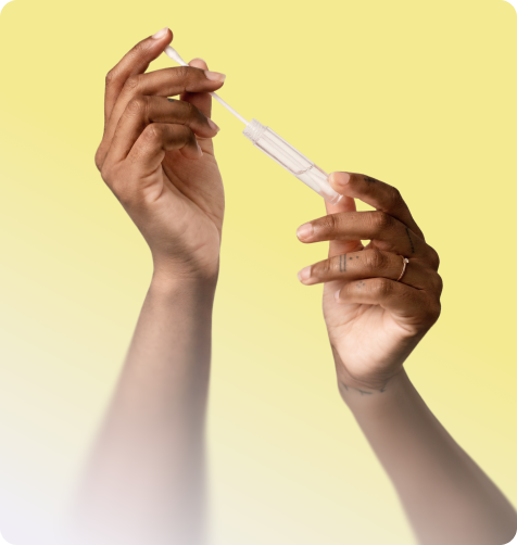 Hands collecting a skin swab sample for SLST microbiome testing.